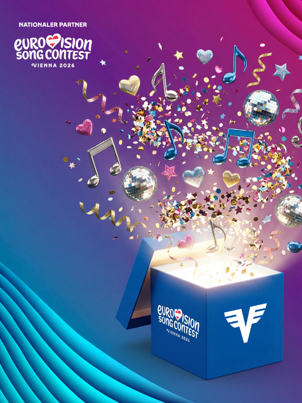 Eine blaue Volksbank-Partybox explodiert auf dem Bild und offenbart Discokugeln, Konfetti, Herzen, Sterne und Musiknoten, die in die Höhe fliegen. Der Hintergrund ist ein Blau bis pinker Farbverlauf. Im linken oberen Eck steht der Schriftzug: "Nationaler Partner des Eurovision Song Contest Vienna 2026"